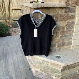 Ladies black Dokotoo Sweater, white piping. Size Large never worn